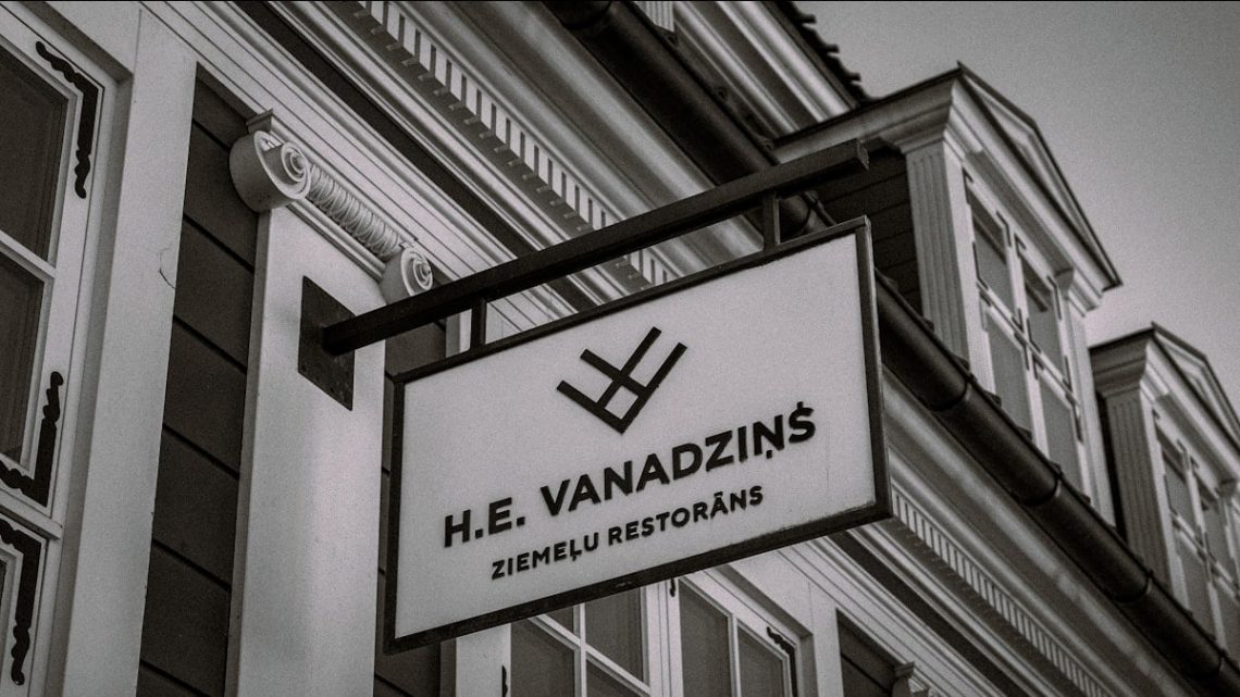 H.e. vanadzins restaurant sign on building.