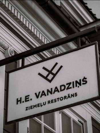 H.e. vanadzins restaurant sign on building.